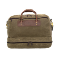 Waxed Canvas and leather duffel bag with a separate compartment for boots or dirty clothes. 
