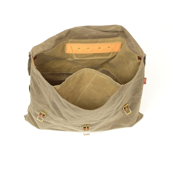 Large slip pocket on he inside front of each of these packs.
