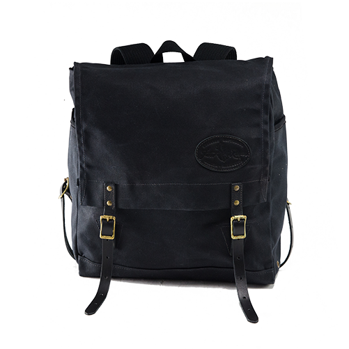 The heritage black version of the Sojourn Pack is made with waxed canvas, premium leather and high quality brass buckles.