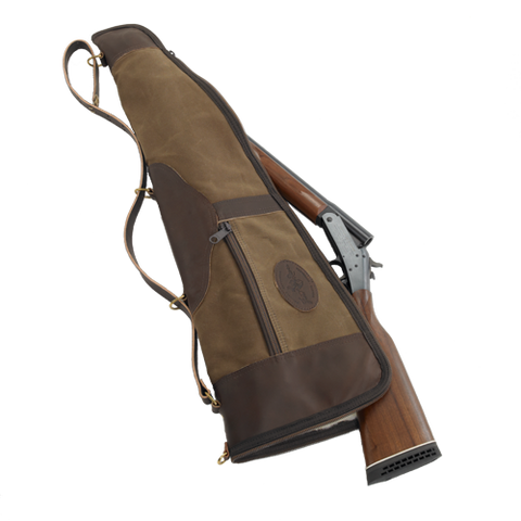 Beautiful case for a breakdown style gun, lined with sherpa, made with waxed canvas, premium leather, solid brass, and includes an exterior zippered pocket for additional storage.