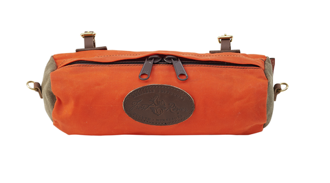 Two leather straps with brass buckles keep this bag secured to your handle bars.