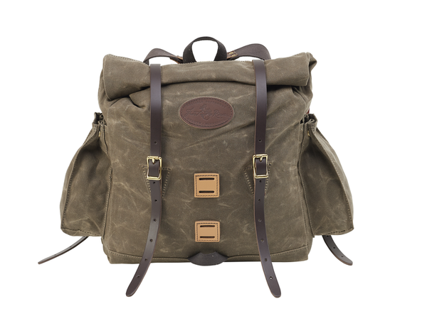 Frost River backpack rolled down tightly to show  how it can be reduced in size when less items are in the pack
